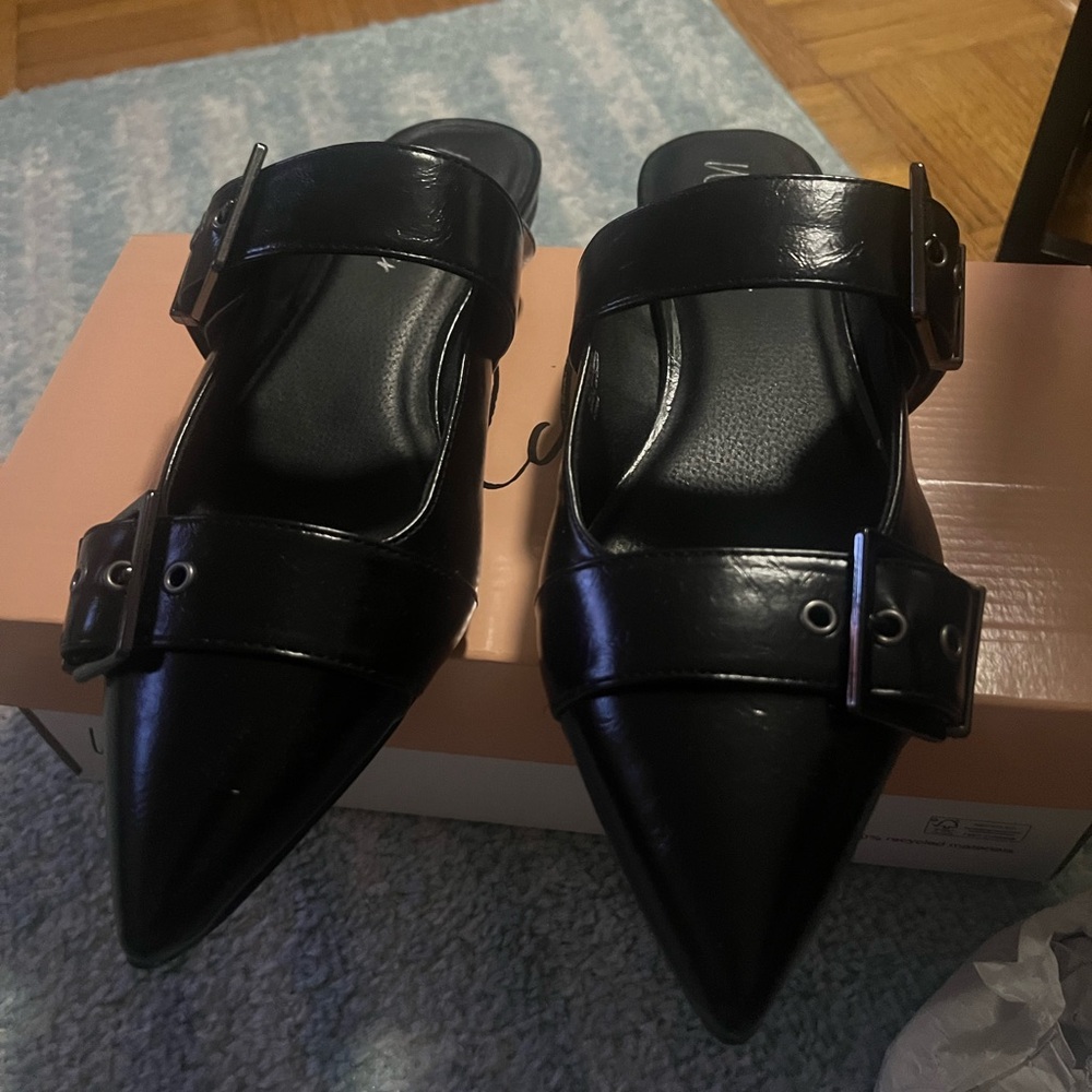 Wild Pair Black Buckle Flats